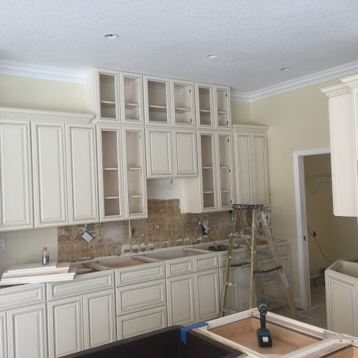 white kitchen with ladder | kitchen cabinets in Sarasota FL